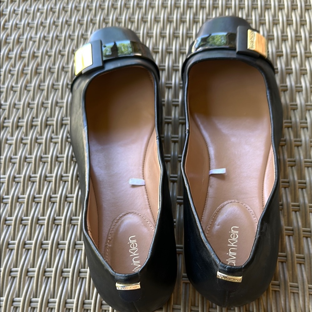 Calvin Klein Black and Gold Loafers with Elegant Design
